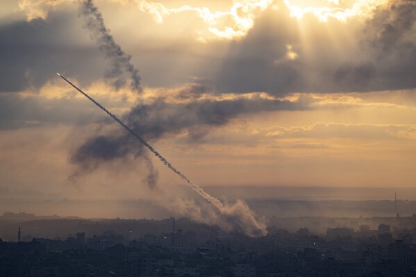 Rockets are fired toward Israel from Gaza, Saturday, Oct. 7, 2023. (AP Photo/Fatima Shbair)